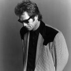 Huey Lewis & The News>